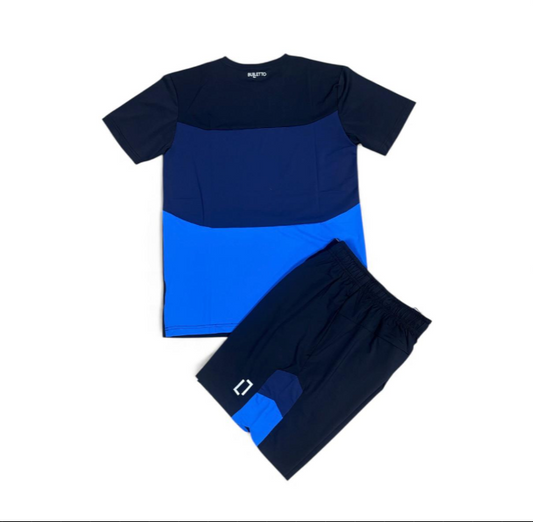 Navy and blue athletic outfit with a logo on a white background