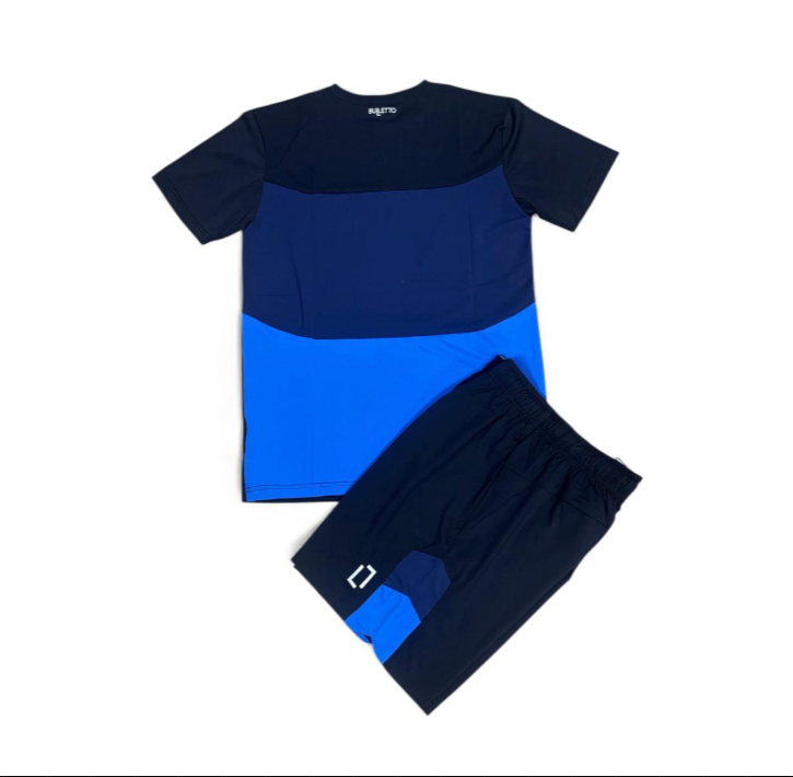 Navy and blue athletic outfit with a logo on a white background